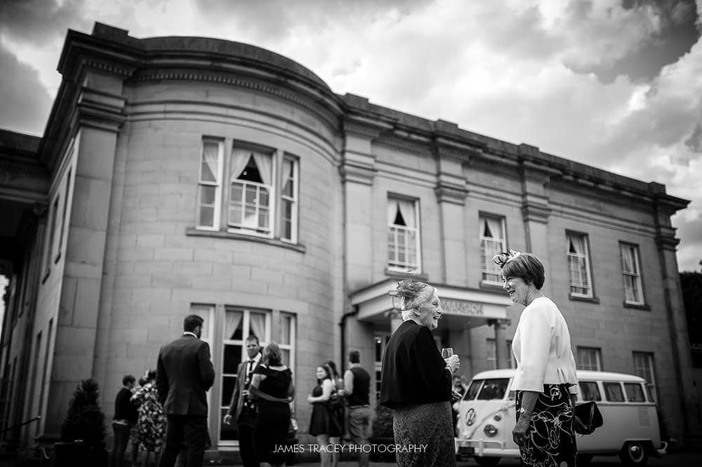 wedding guests outside the mansion leeds