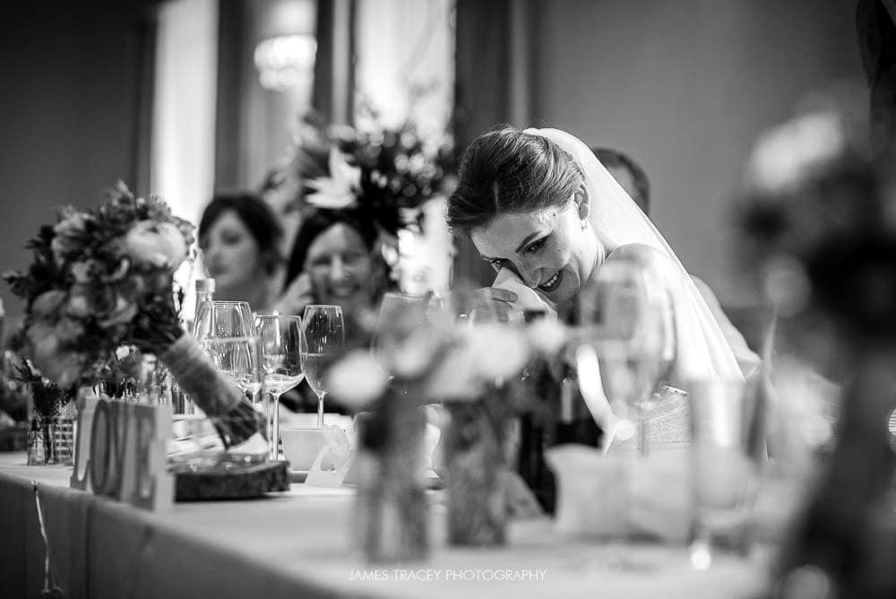 bride laughing at speeches