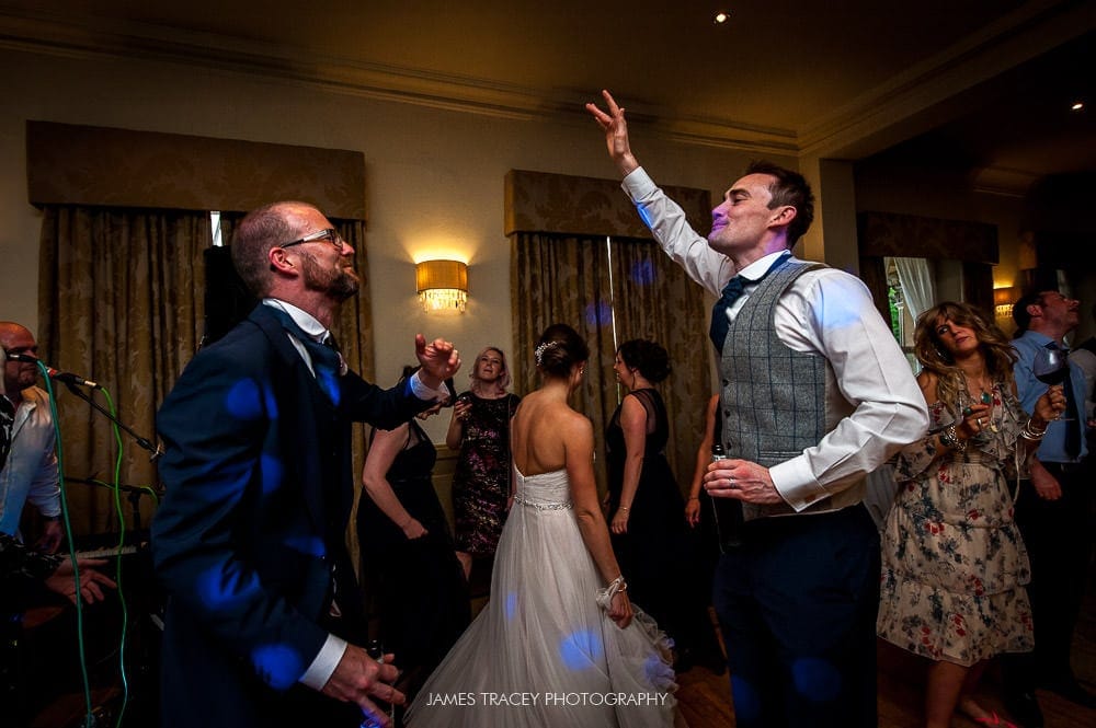 groom and usher dancing