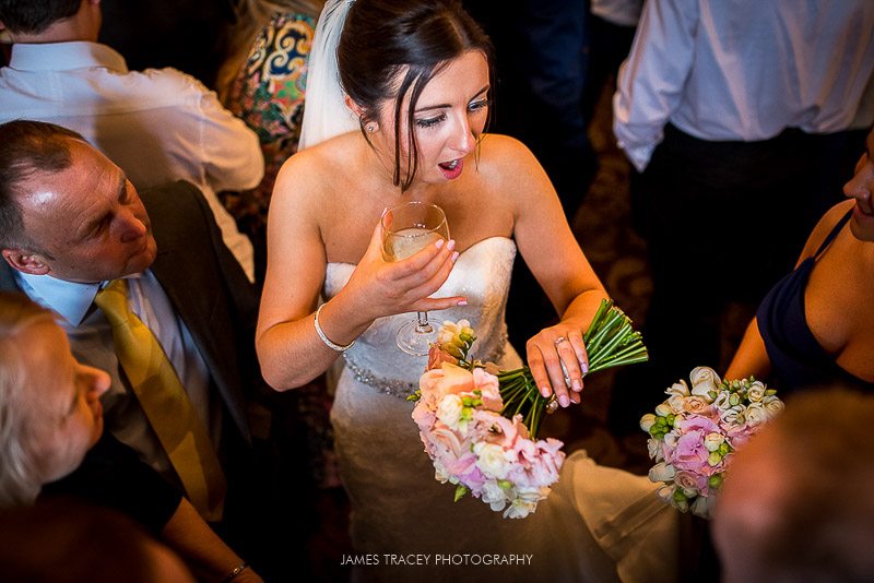 bride showing off her wedding ring