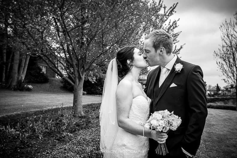 bride and groom kissing