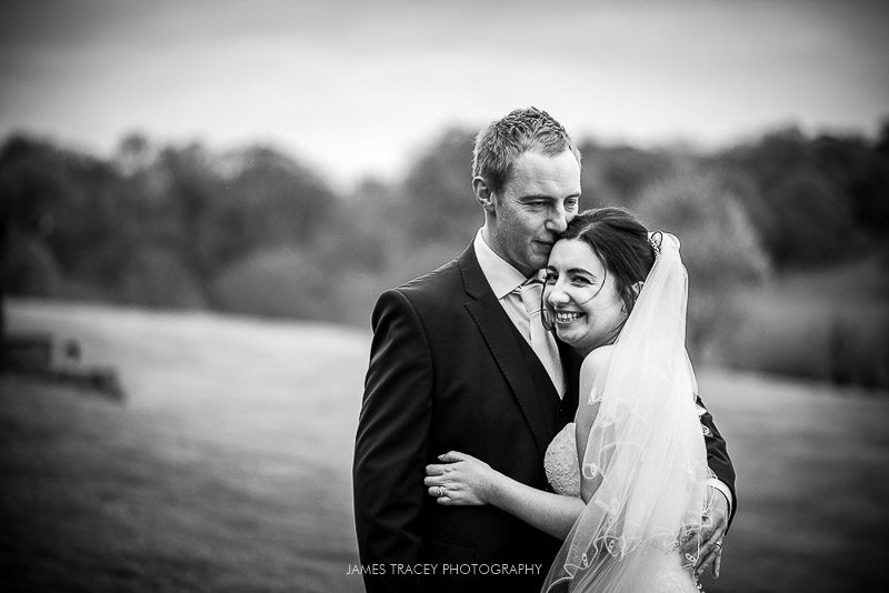 bride and groom cuddling