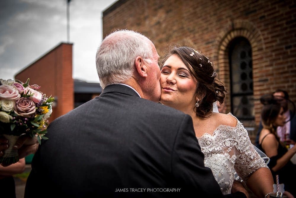 guest kissing bride