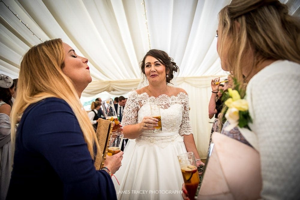 bride sharing a joke with friends