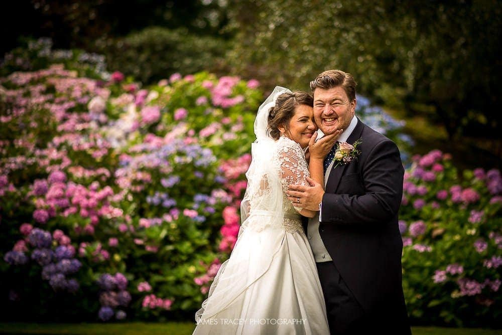 bride and groom laughing in gardens of the citadel