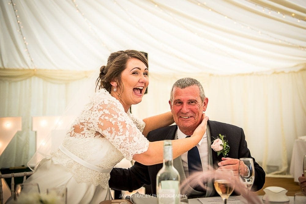 bride strangling her father