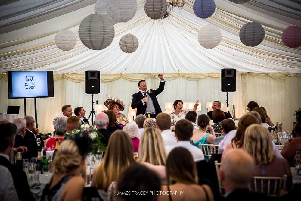 groom speaking the guests