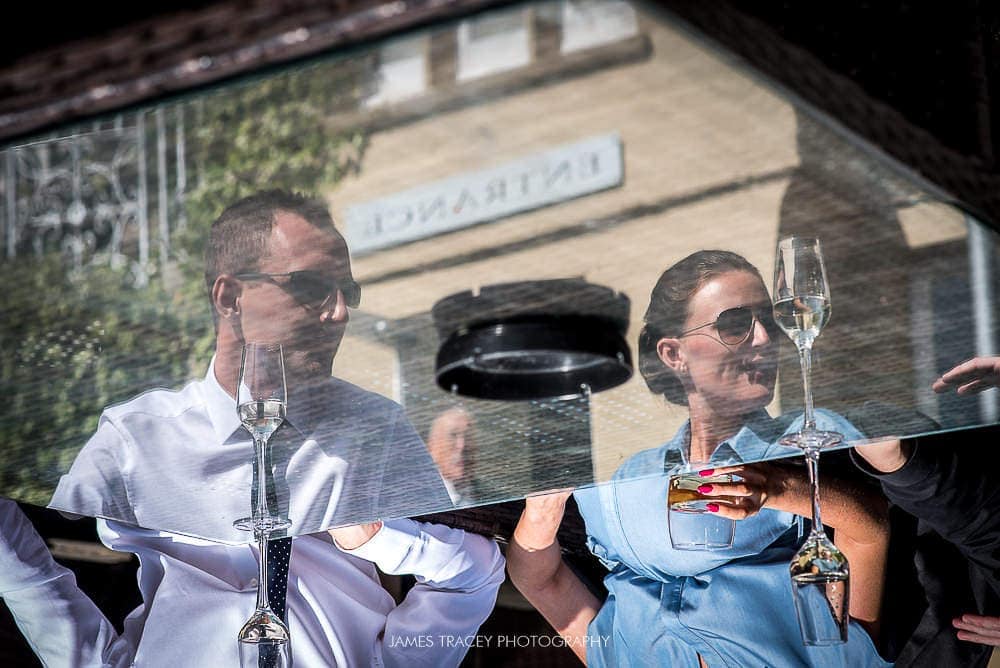 reflected wedding guests