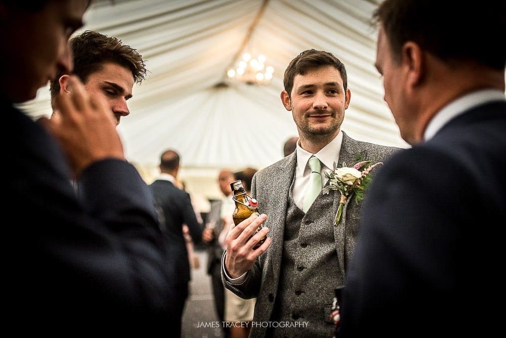 groom chatting to friends