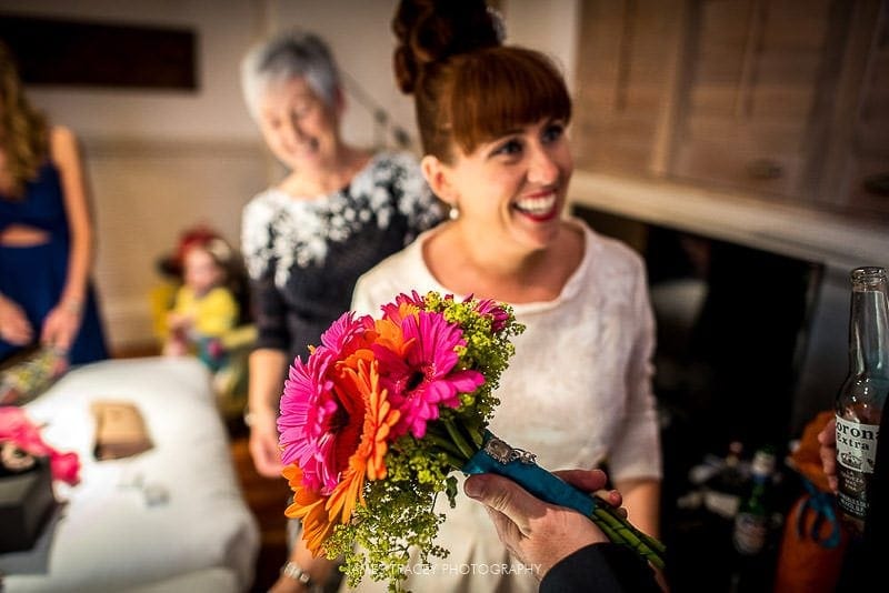 bride showing off her bouquet