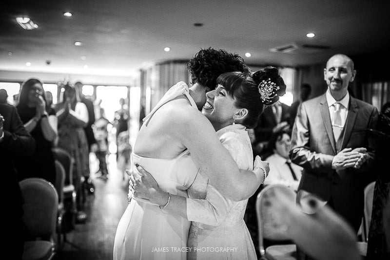 wedding hugs at service