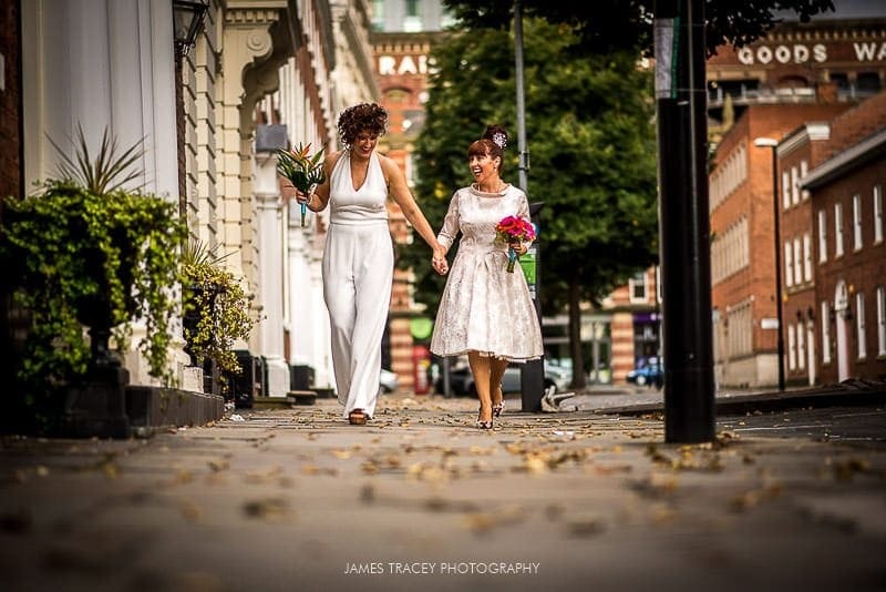 two brides walking in streest of manchester