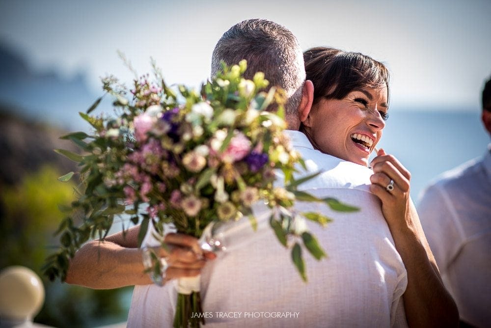 bride hugginh her dad