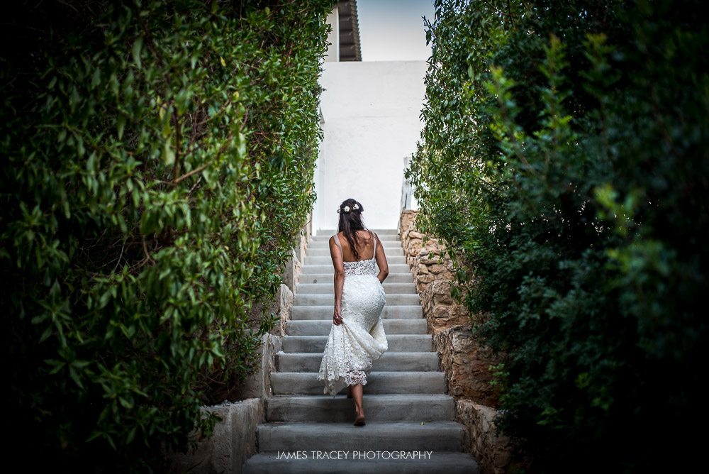 bride walking up stairs