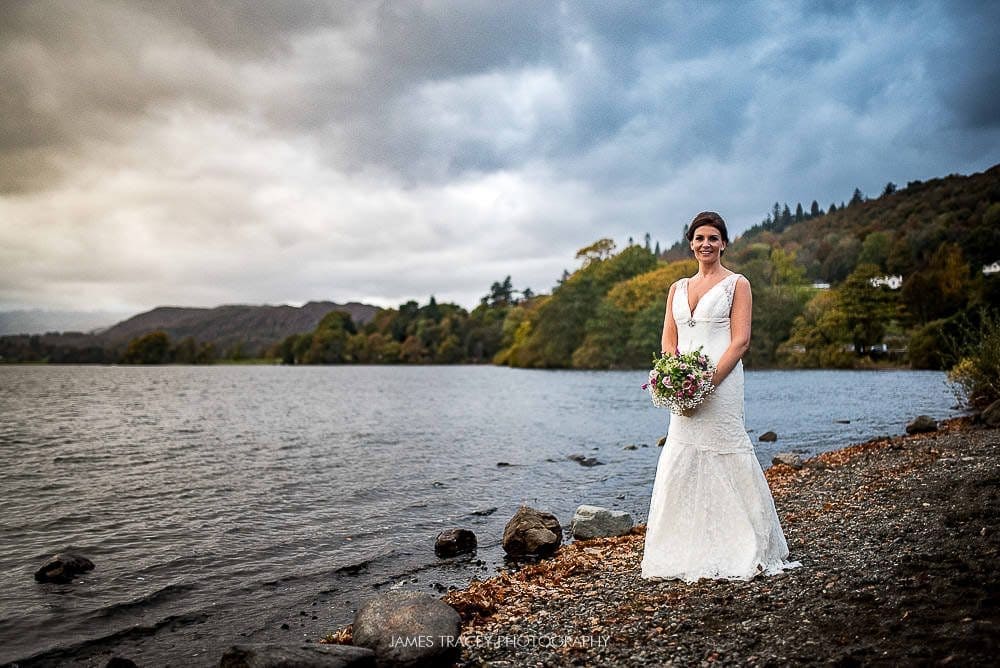 bride posing in her charlotte balbier wedding dress