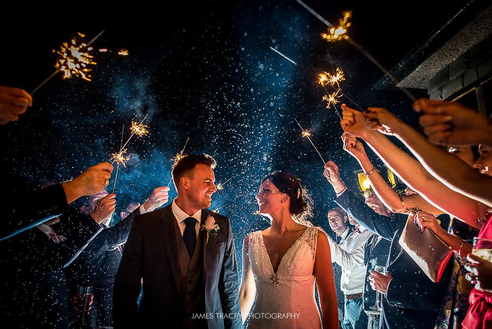 bride and groom in sparklers