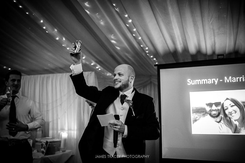 best man toasting wedding couple