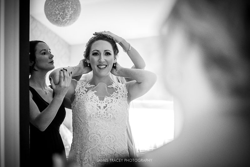 bride having her veil fitted