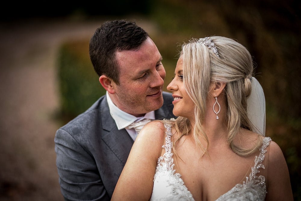 bride and groom close together