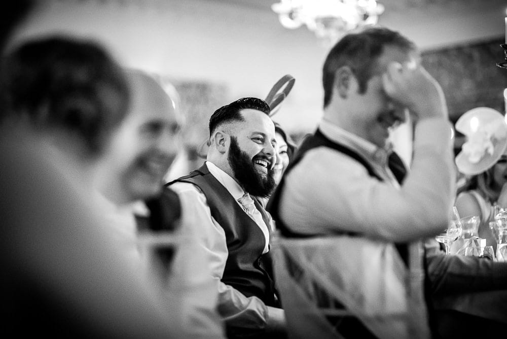 wedding guests laughing