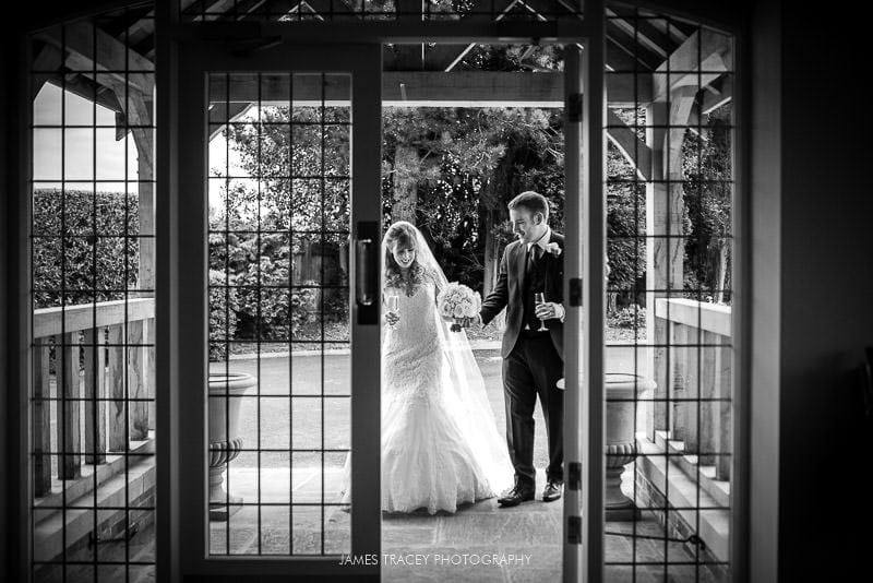 bride and groom walking into the pavillion at colshaw hall