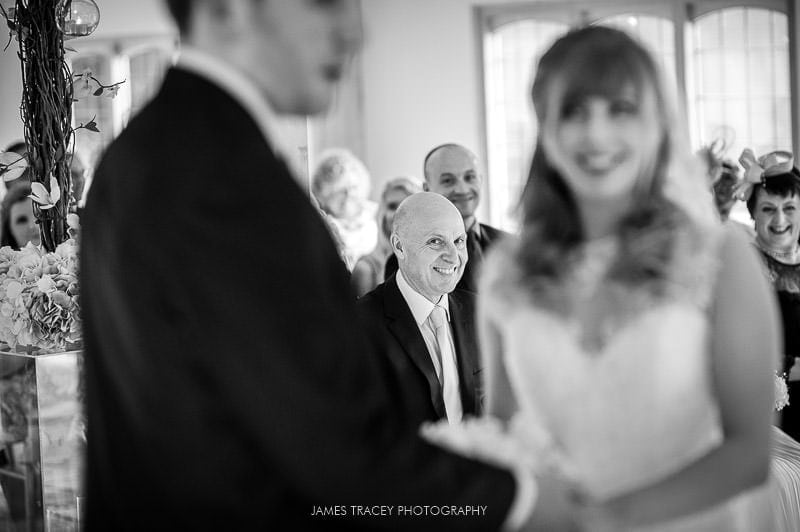 smiling father of the bride