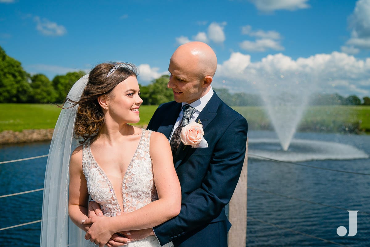 wedding couple at merrydale manor lake