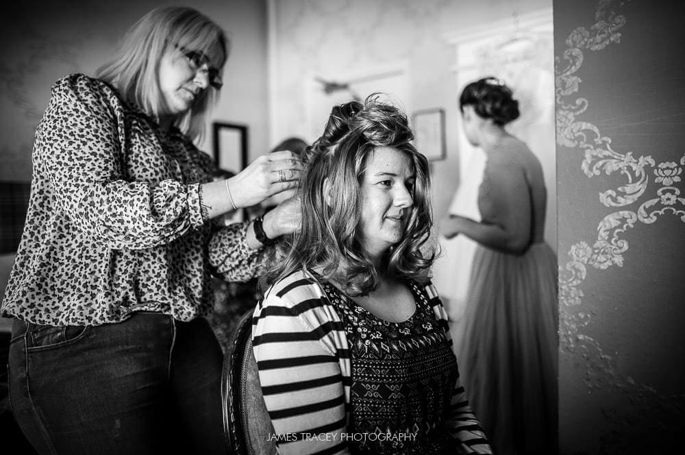 bride having hair set