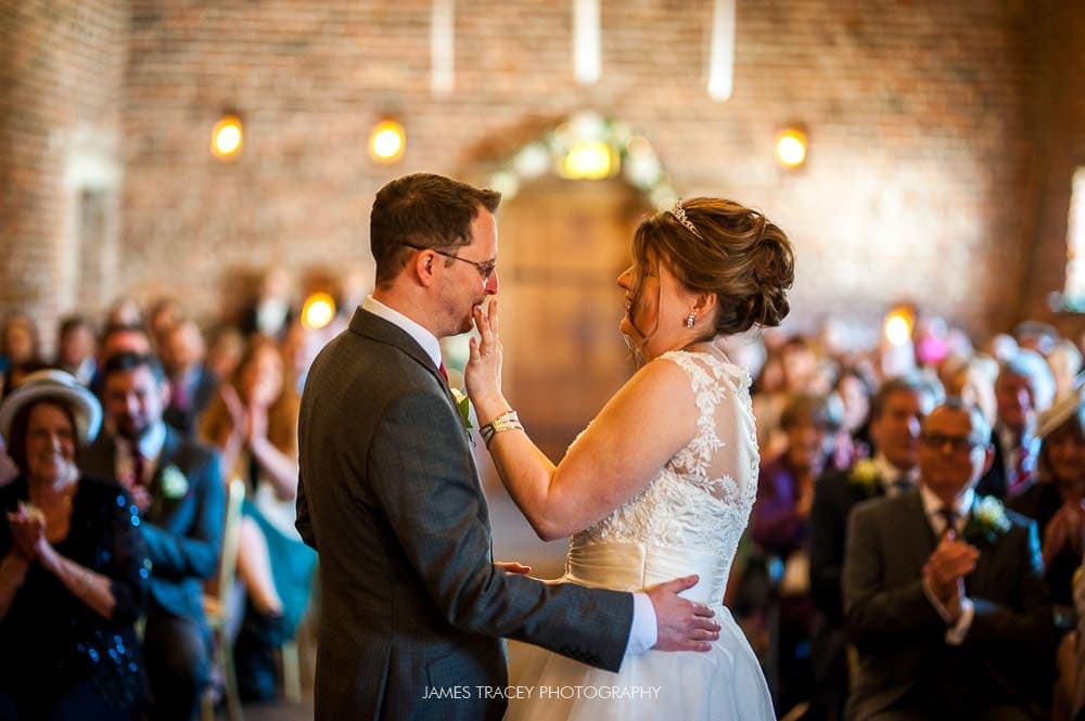 bride wiping lipstick from her husband