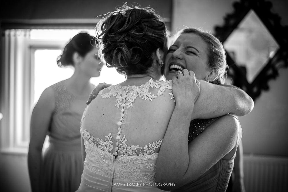 bride being hugged