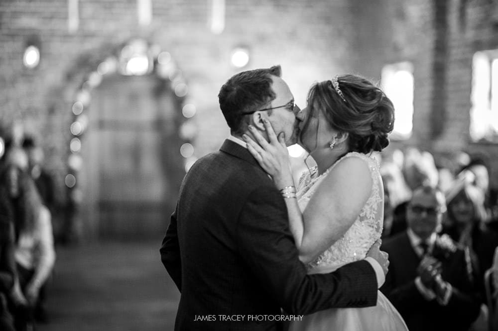 bride and groom kissing at meols hall