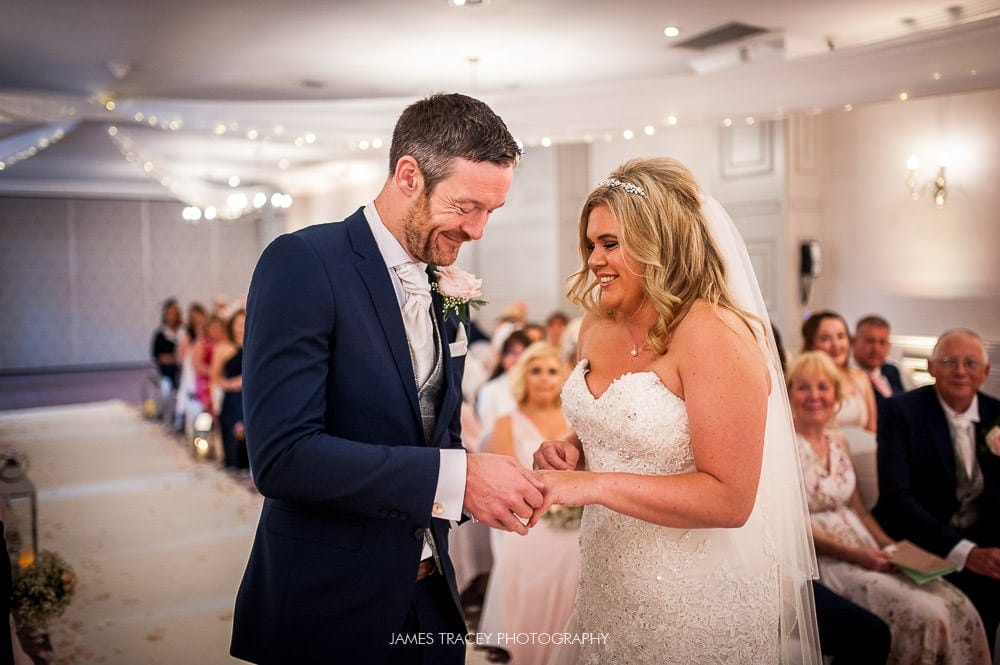 exchange of wedding rings at mottram hall