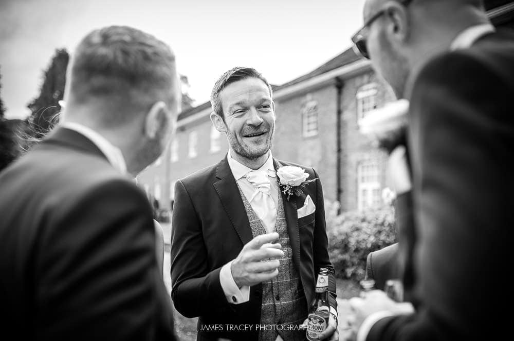 grooms chatting at mottram hall