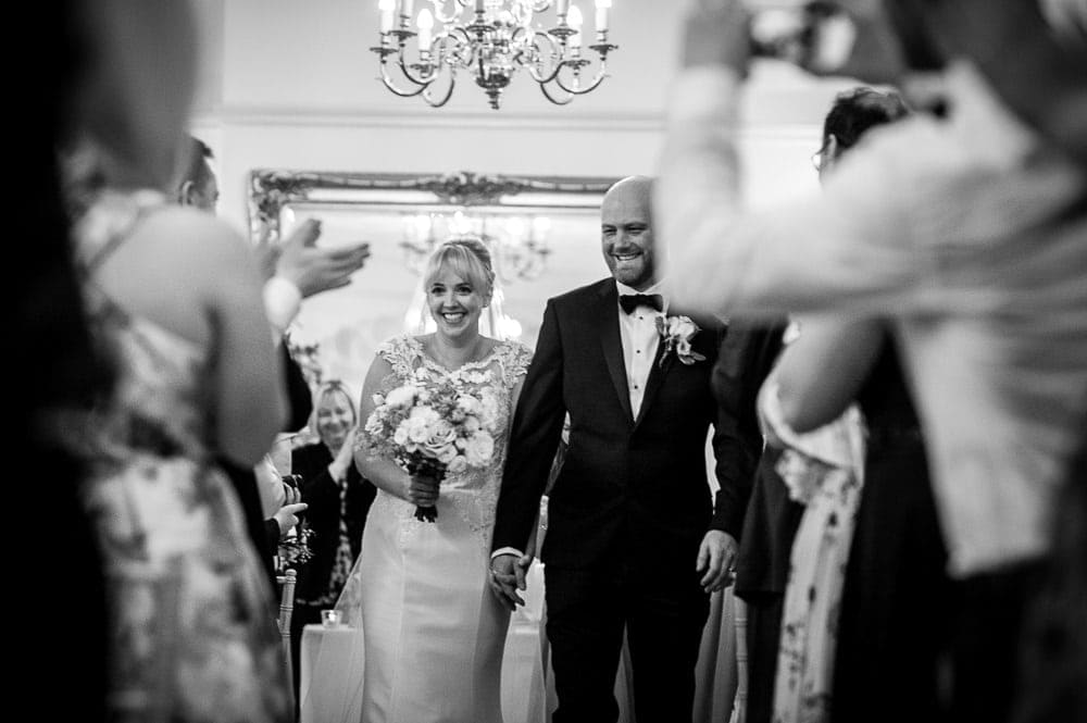 bride and groom walking down the aisle