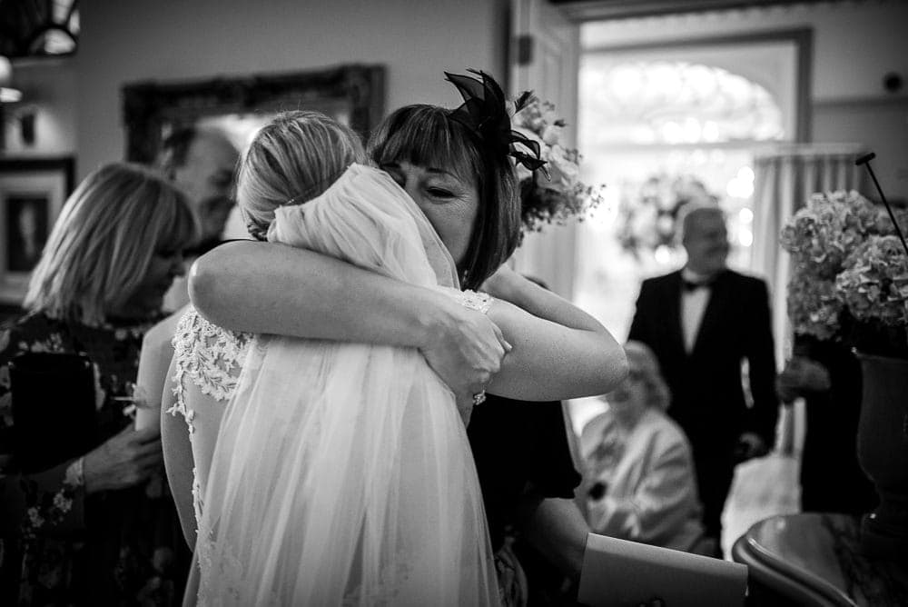 bride being hugged