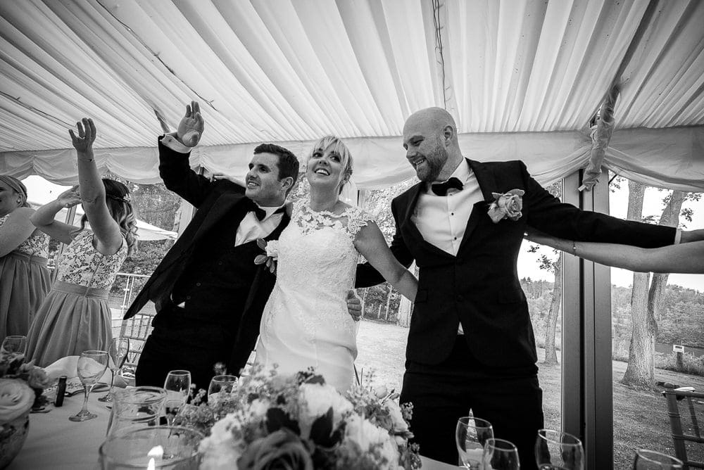 top table dancing to singing waiters