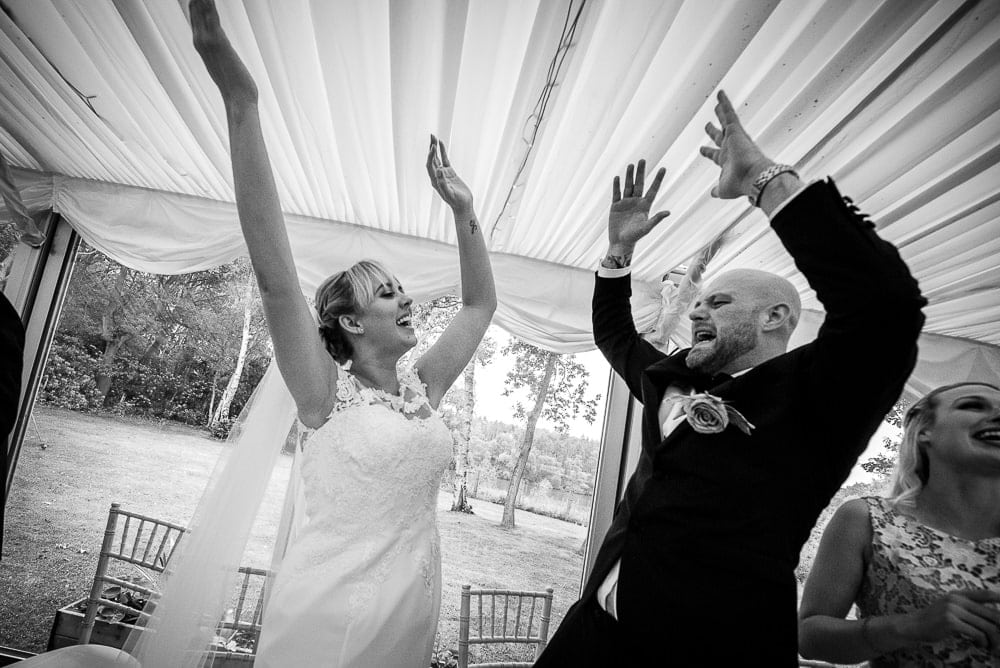 bride and groom high five