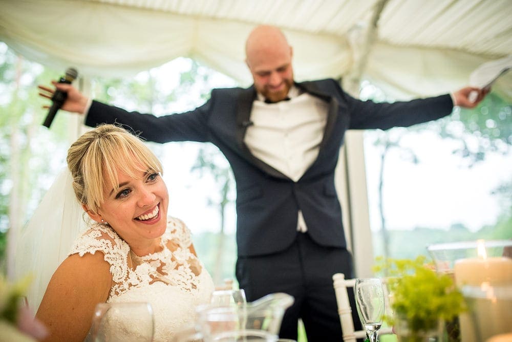 groom making bride laugh at nunsmere hall