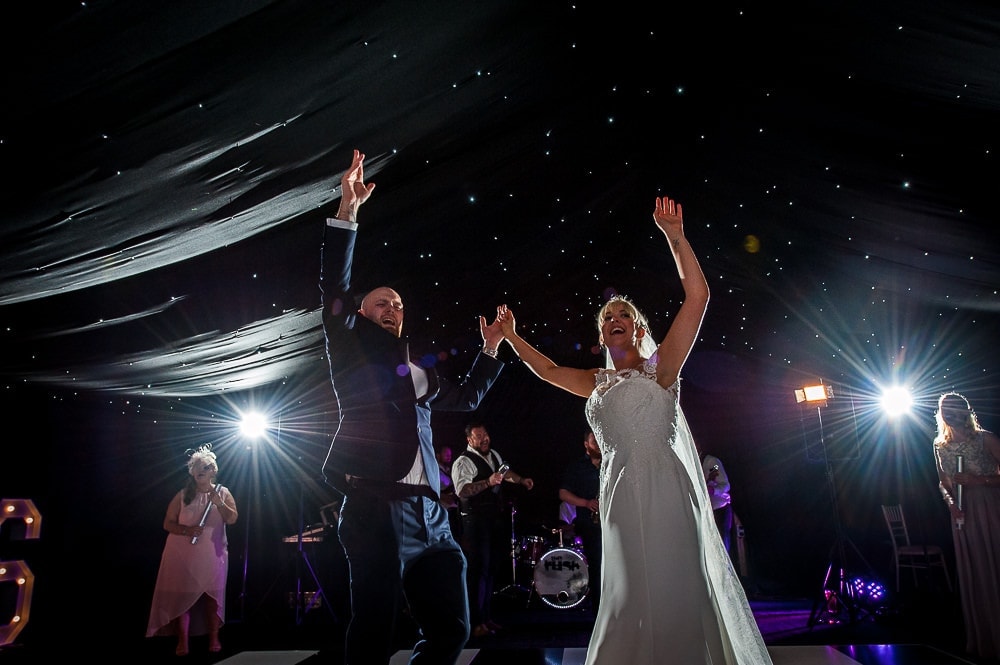 bride and groom dancing