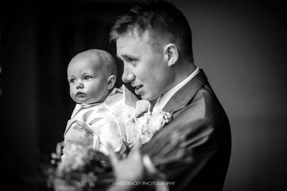 groom and his young child