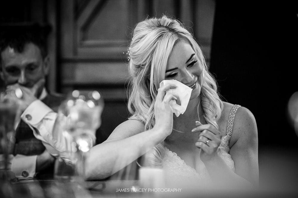 bride wiping a tear away