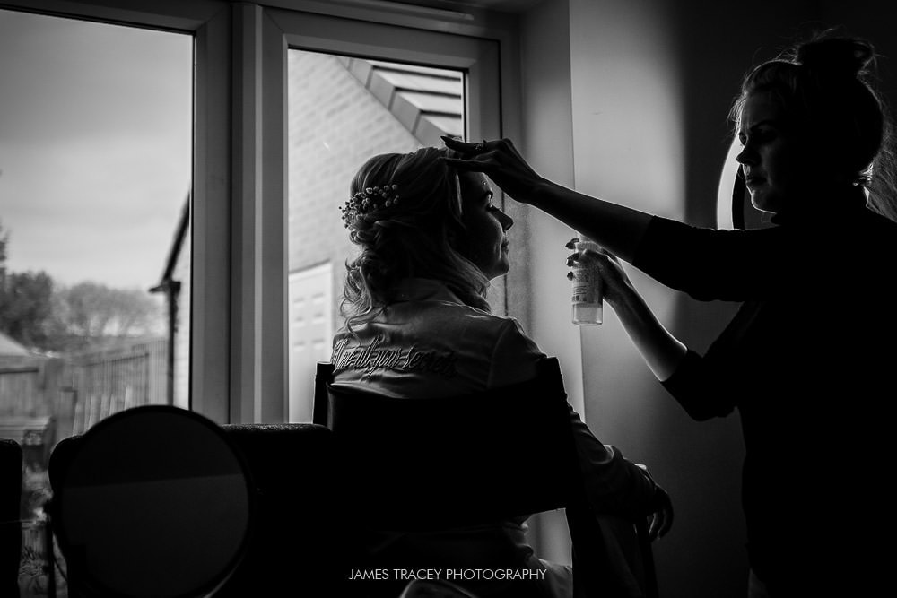 black and white shot of bridal prep