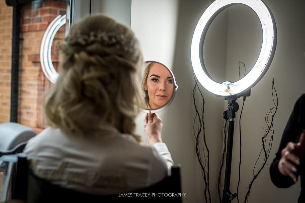 bride looking in a mirror