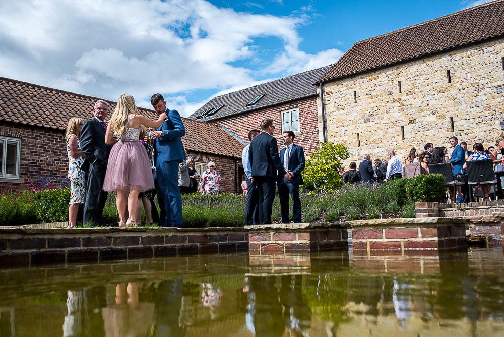 low shot of the pond at priory cottages