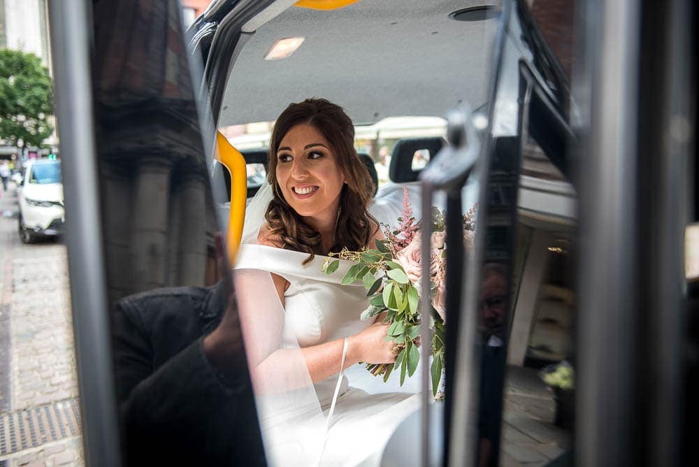 bride in taxi in manchester