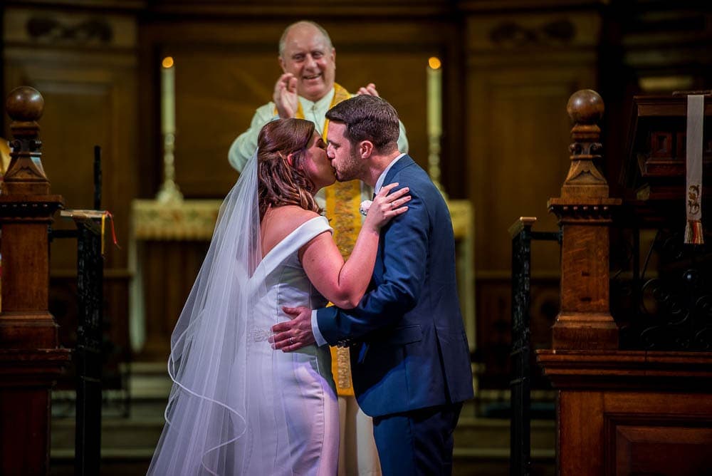 first kiss at a wedding