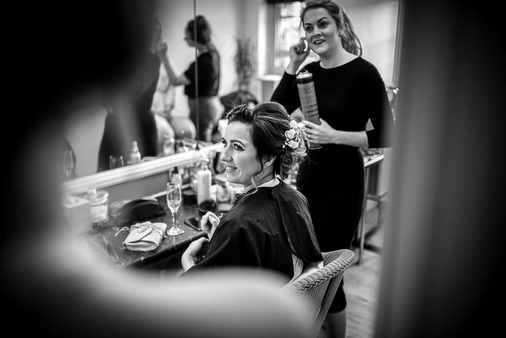 bride having her hair done