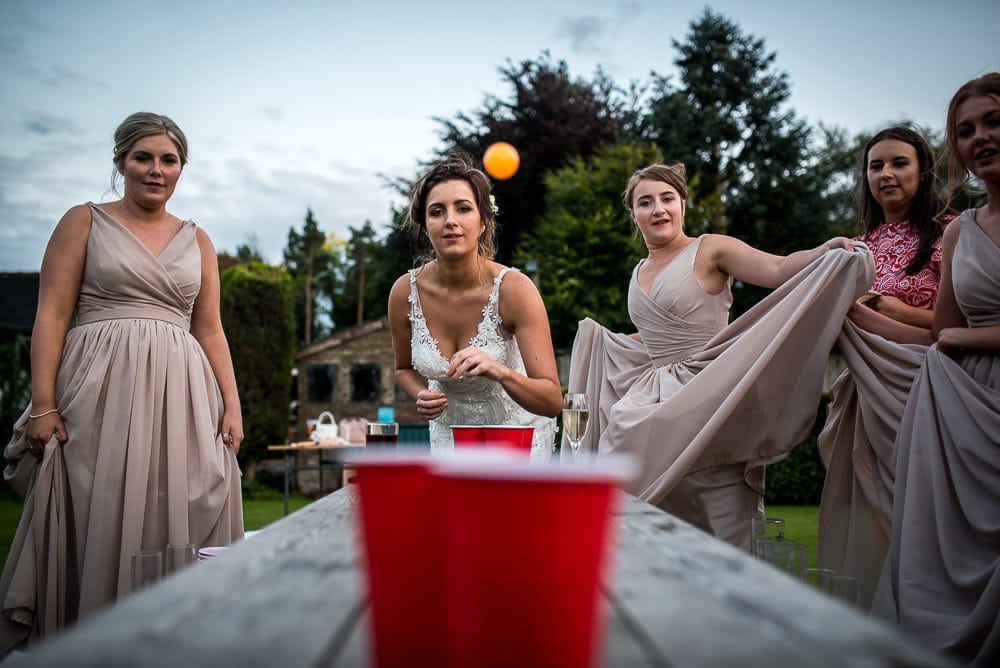 bride playing beer pong