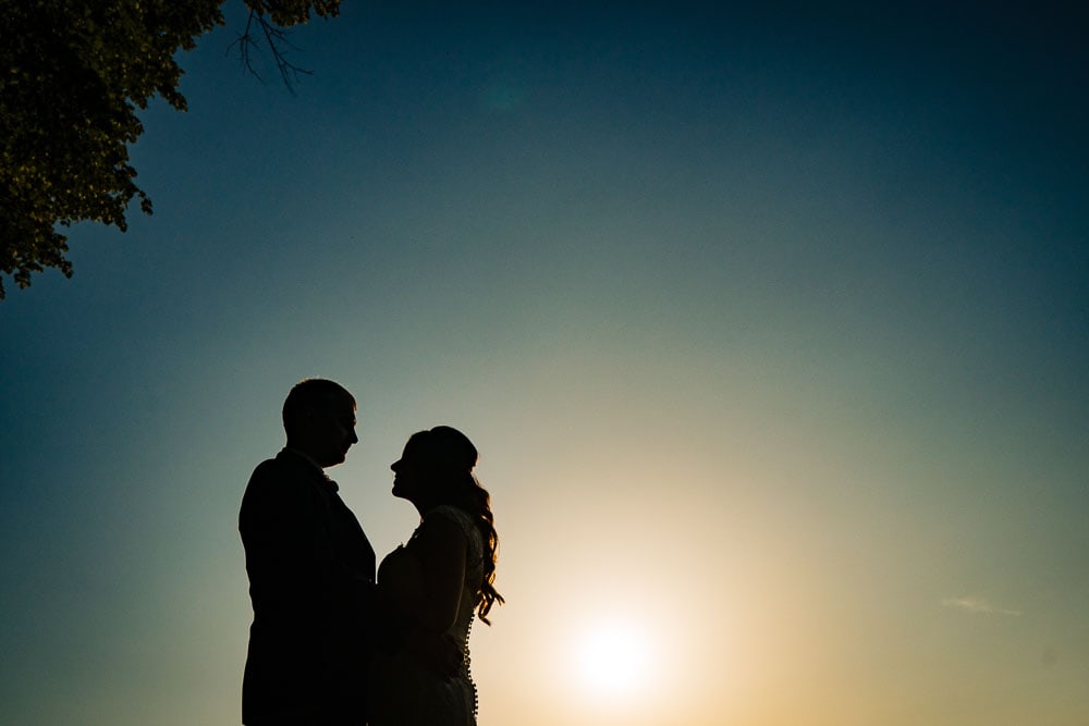 silhouette of bride and groom at mottram hall