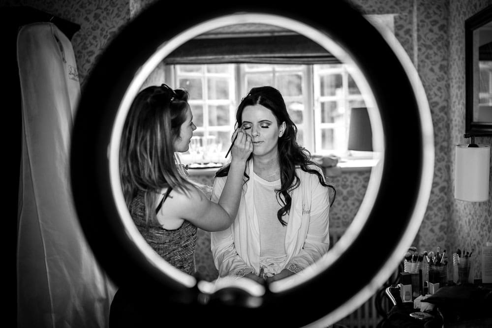 bride having make up at mottram hall